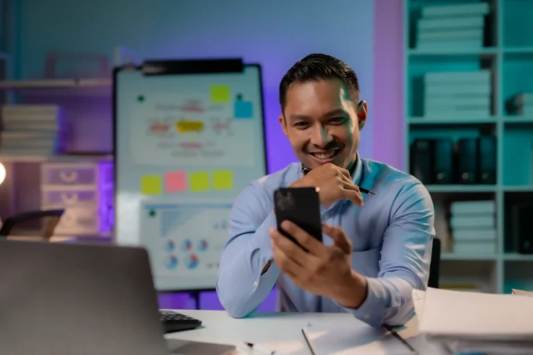 Professional using smartphone for communication integration