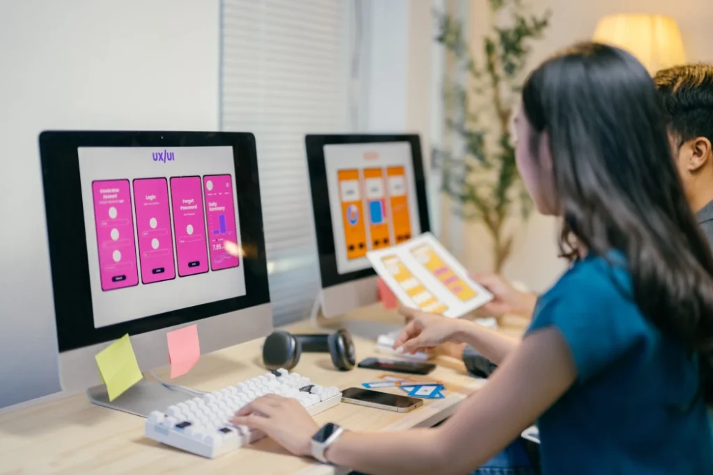 Designers building mobile app with no code workflow automation